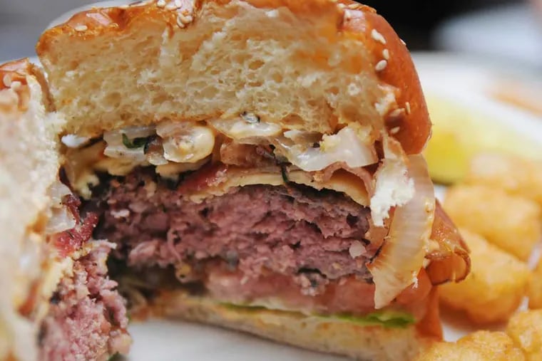 The bacon burger at the Royal Tavern is a signature item.