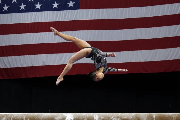Morgan Hurd competes on the balance beam at the U.S. Gymnastics Championships, Sunday, Aug. 19, 2018, in Boston. (AP Photo/)