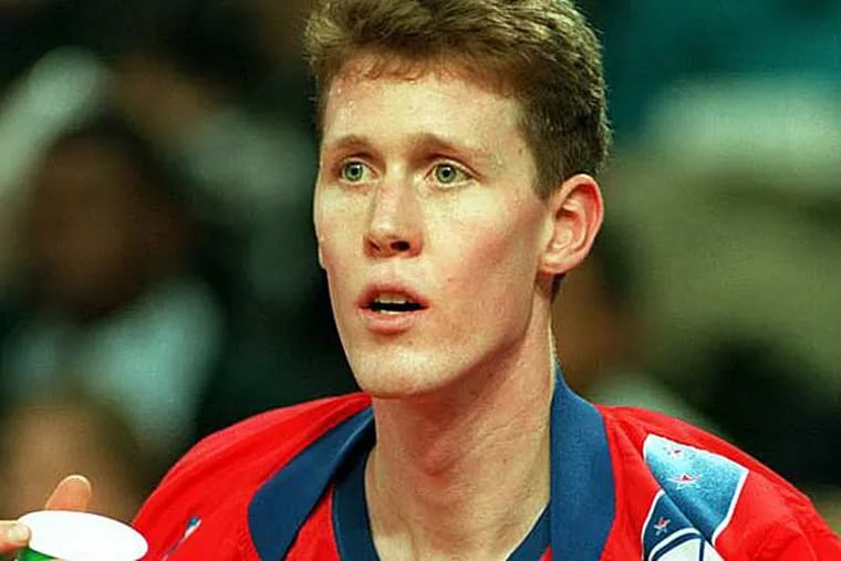 Shawn Bradley takes a break on the bench during a against the Bulls back on Jan. 17, 1994.