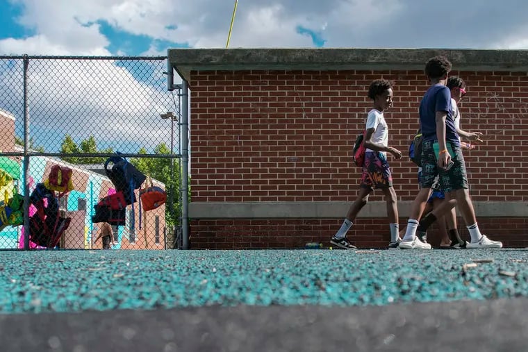 Kids exit the Penrose pool through the playground at closing time in North Philadelphia on Friday, June 24, 2022. Rec centers are vital to the city's youth, as they are public spaces that kids can hang out. However, according to The Trust for Public Land, the city only spent $73 per capita on parks and recreation, while the national average is $98.