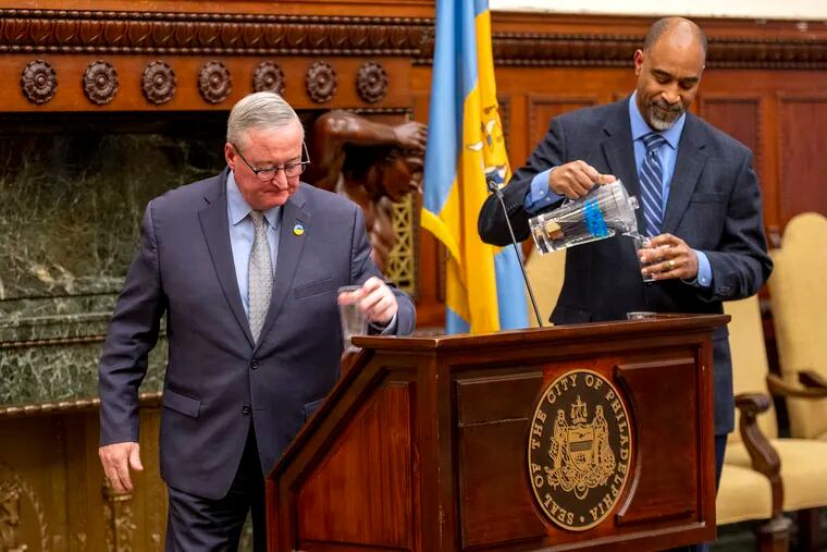 Mayor Jim Kenney and Mike Carroll (right) Deputy Managing Director for Transportation, Infrastructure and Sustainability take a drink of Philadelphia city tap water following a press conference. Kenney said, “We can all confidently say the threat has passed. I repeat, all the city’s drinking water is safe to drink.” On Friday a latex emulsion solution spilled from the Trinseo Altuglas facility in Bristol into Otter Creek and then into the Delaware River.