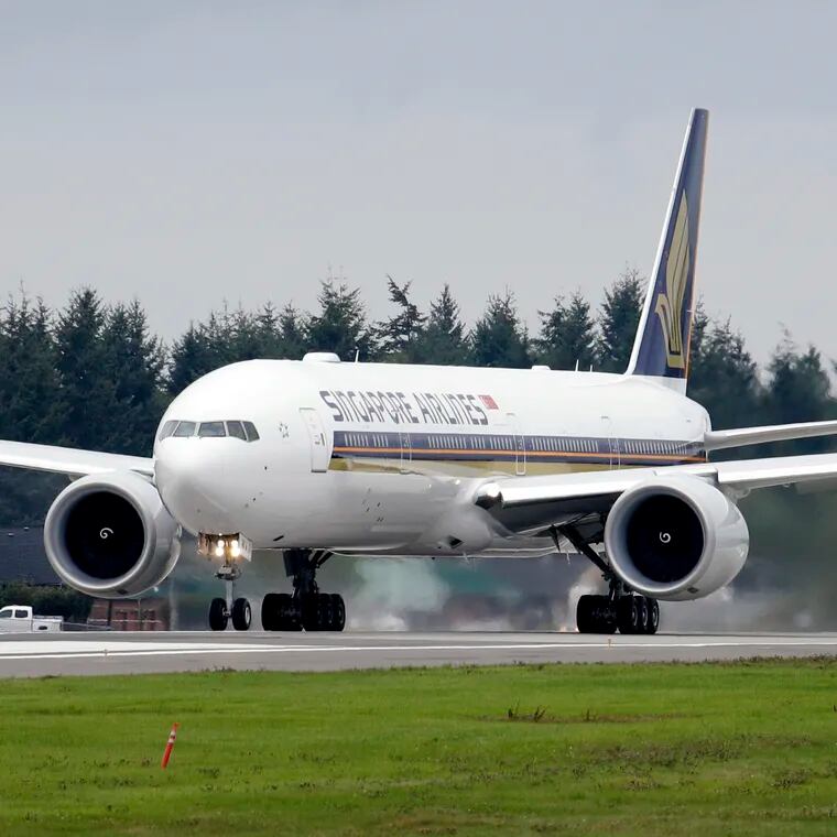 A Singapore Airlines Boeing 777-312ER readies to take off from Paine Field in Everett, Wash., in 2013.