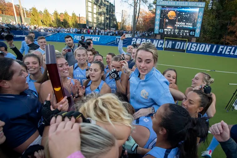 Head coach Erin Matson and her UNC squad celebrates after winning the NCAA championship.