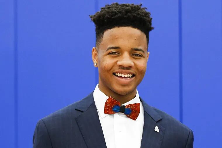 The Philadelphia 76ers' Markelle Fultz holds a jersey after being introduced at the team's training complex in Camden, N.J., on Friday, June 23, 2017. (Yong Kim/Philadelphia Daily News/TNS)