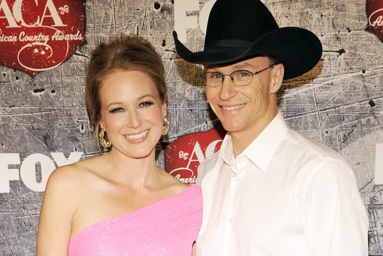 FILE - This Dec. 10, 2012 file photo shows singer Jewel, left, and Ty Murray at the American Country Awards in Las Vegas. Jewel and her husband are divorcing after a 16-year relationship. The 40-year-old singer wrote in a letter posted on her website Wednesday, July 2, 2014, that she and Ty Murray want their separation “to be nothing less loving than the way we came together.” Jewel and Murray were married in 2008. They have a son named Kase. (Photo by Jeff Bottari/Invision/AP, File)