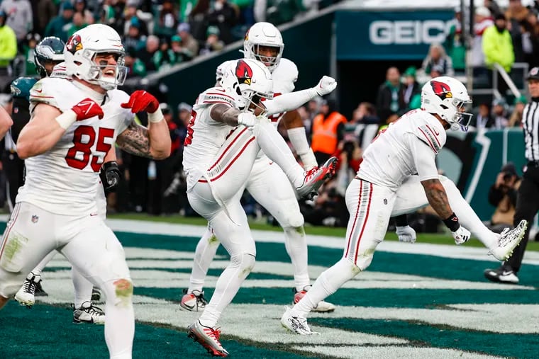 The Arizona Cardinals celebrate after running back James Conner scored the go-ahead touchdown in the fourth quarter at Lincoln Financial Field.