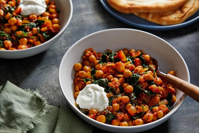 Chana Saag (Spinach, Tomato and Chickpea Curry). MUST CREDIT: Photo by Tom McCorkle for The Washington Post.