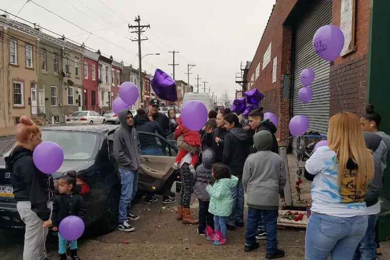 Family and friends gathered on a Philadelphia corner on the first anniversary of Cristina Tosado’ss death. Tostado was shot and killed near 2nd and Cambria on Feb. 19, 2017.