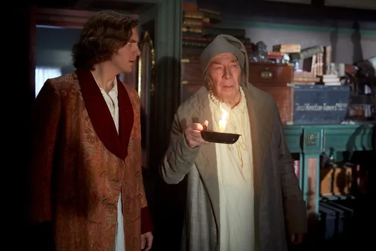 Dan Stevens and Christopher Plummer in ‘The Man Who Invented Christmas.’