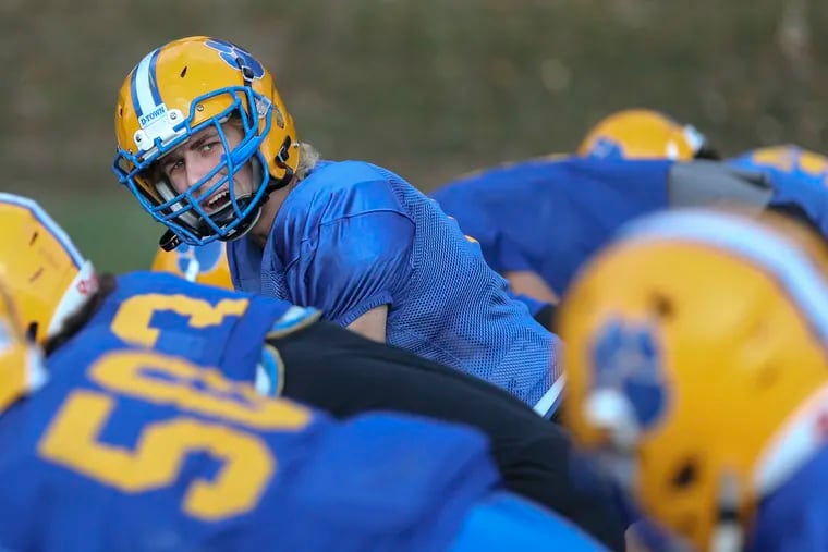 Downingtown East senior quarterback Andrew Person has led the Cougars to a 9-1 record and a share of the Ches-Mont League National Division title.