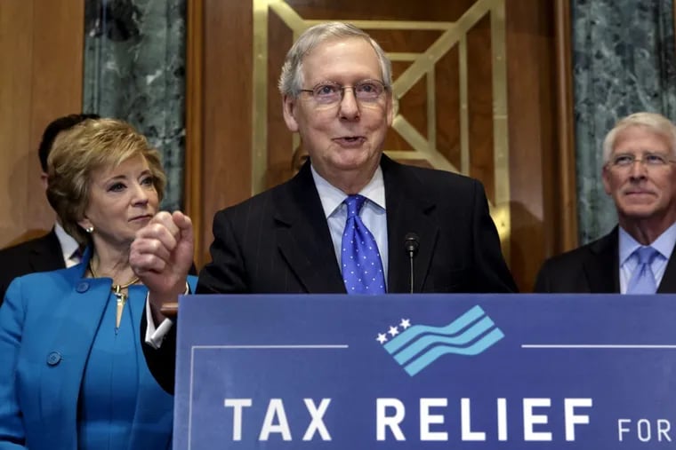Senate Majority Leader Mitch McConnell (R., Ky.) is flanked by Small Business Administration Administrator Linda McMahon and Sen. Roger Wicker (R., Miss.) while discussing tax reform with a group of small-business owners on Nov. 30.