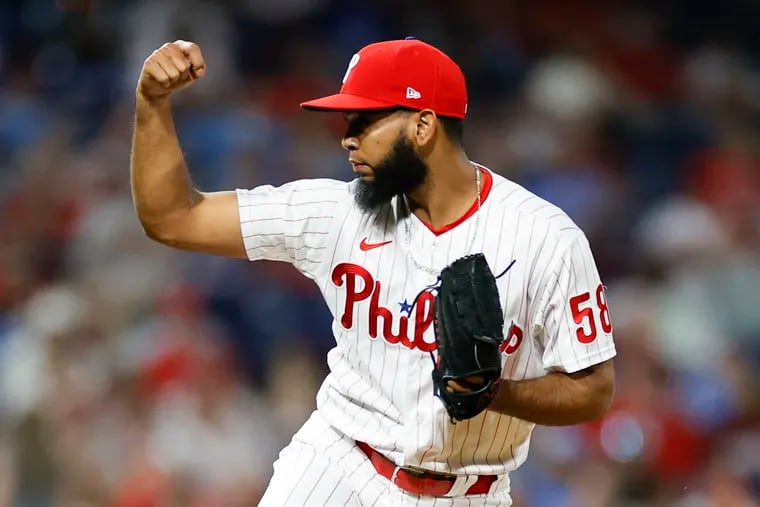 Phillies reliever Seranthony Dominguez will be out at least 15 days after experiencing tightness in his right triceps on Saturday.
