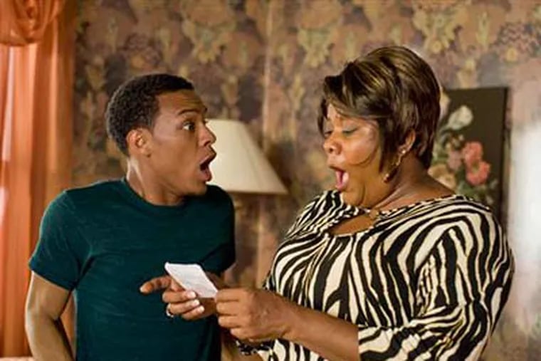 Bow Wow, left, and Loretta Devine appear in a scene from "Lottery Ticket." (AP Photo/Warner Bros., David Lee)