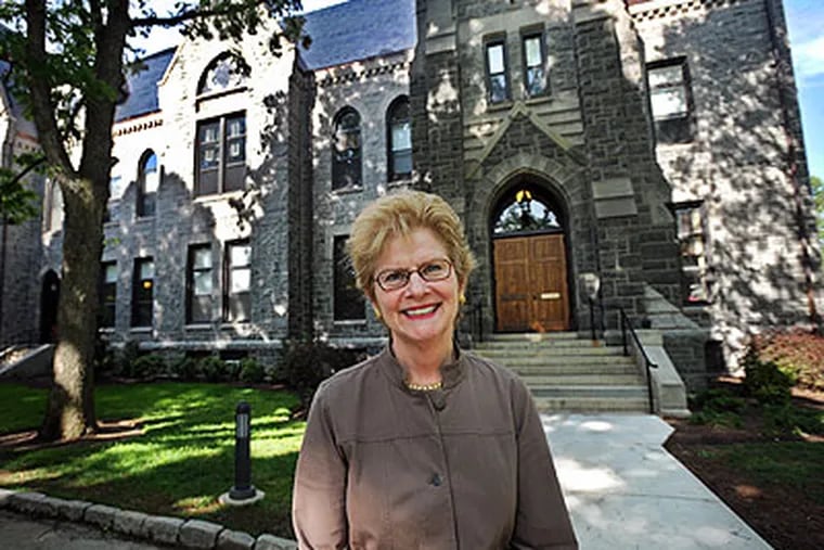 Bryn Mawr College President Jane Dammen McAuliffe in front of Taylor Hall, where the president's, dean's and other administrative offices are located. (Sharon Gekoski-Kimmel / Staff Photographer)