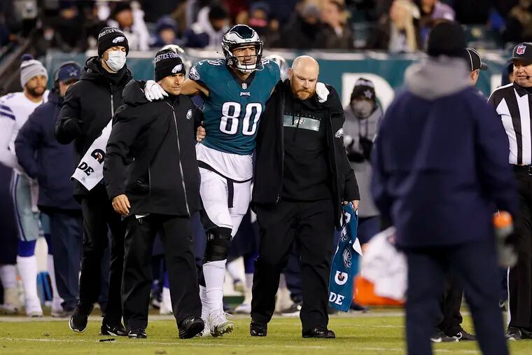 Eagles tight end Tyree Jackson gets help leaving the field after getting injured in the fourth quarter on Saturday.