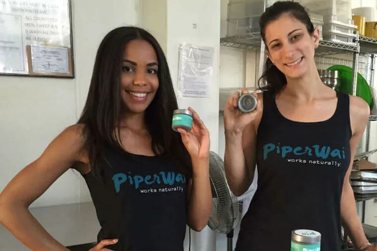 Sarah Ribner (left) and Jess Edelstein are co-founders of PiperWai, an all-natural charcoal deodorant that prevents body odor and keeps users dry. (Michael Hinkelman / Staff)