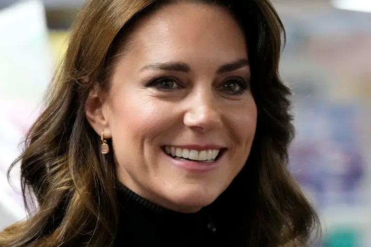 Kate, Princess of Wales, has issued an apology for editing the photo of her and her children. The first official photo of her since her abdominal surgery has been retracted by news services, including the Associated Press, after concerns that the photo was doctored. It comes amid rampant conspiracies about the princess's health. (AP Photo/Frank Augstein, Pool)
