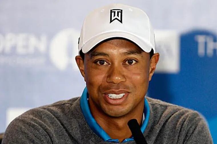 Tiger Woods endured some pointed questions during a press conference at St. Andrews. (AP Photo/Jon Super)