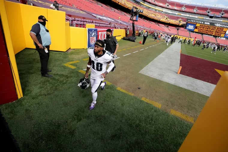 Eagles receiver DeSean Jackson was often seen standing on the sideline with his helmet off in Sunday's season-opening loss at Washington.