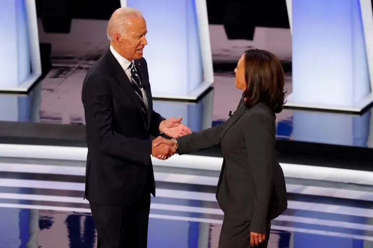 Joe Biden and Sen. Kamala Harris, D-Calif., shaking hands at a Democratic presidential debate in Detroit in July of 2019. Biden picked Harris to be his running mate, making her the first Black woman to be part of a major party’s presidential ticket.