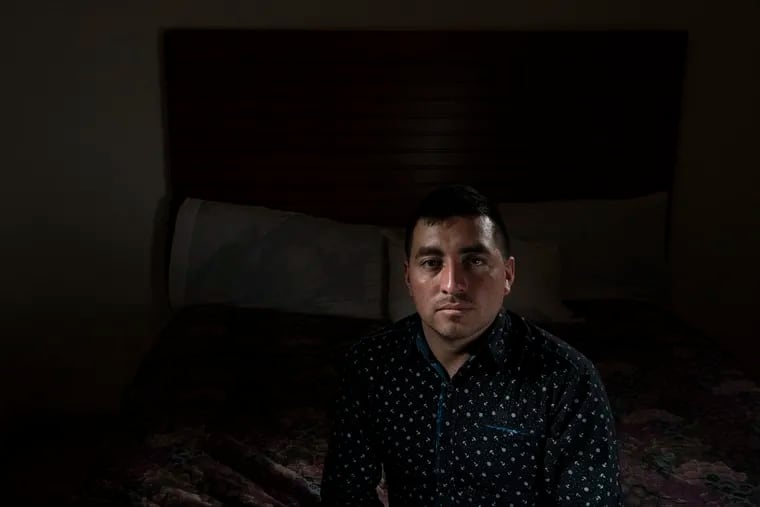 José Ottoniel, 28, from Guatemala, sits for a portrait in Hotel Salazar in Tijuana, Mexico. Ottoniel was separated from his 10-year-old son, Ervin, and deported.
