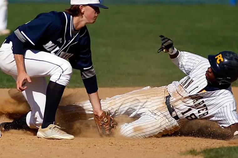 Malvern Prep's David Rodgers tags out Penn Charter's Demitrius Isaac
during the fourth-inning steal attempt on Tuesday, May 6, 2014.  (
Yong Kim / Staff Photographer )