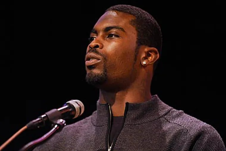 "I know that there are people who will never forgive me and I understand that," Vick said to high school students in Connecticut. (Bob Child/AP)