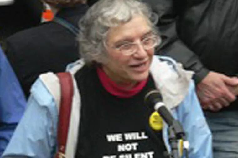 Nina Huizinga wearing a T-shirt with the motto, &quot;We will not be silent.&quot; She was a leader with the Granny Peace Brigade Philadelphia.