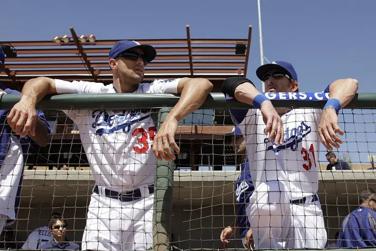 Gabe Kapler (left), with teammate Jay Gibbons, before a Dodgers spring training game in March 2011.