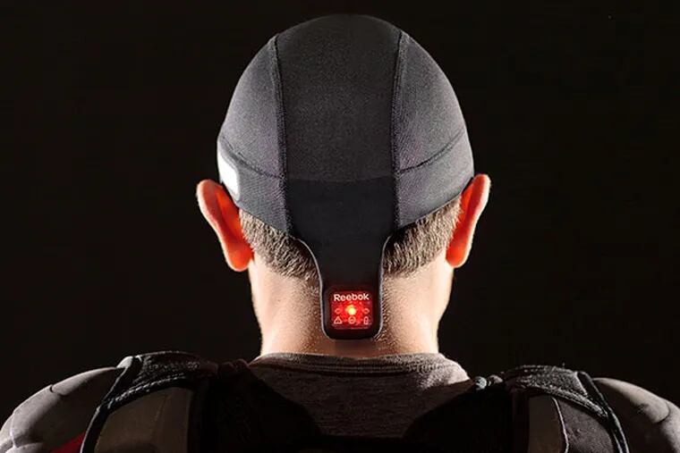 Today’s athletes can wear headgear equipped with mobile sensors that measure and report impacts — data that could raise crucial flags about potential concussions from hard hits in football, hockey or other sports. Reebok offers the technology in the $150 CheckLight created in partnership with MC10 Inc., of Cambridge, Mass. (courtesy photo)