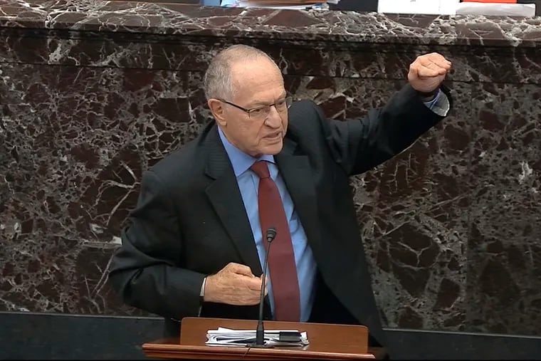 In this image from video, Alan Dershowitz, an attorney for President Donald Trump, answers a question during the impeachment trial on Wednesday.