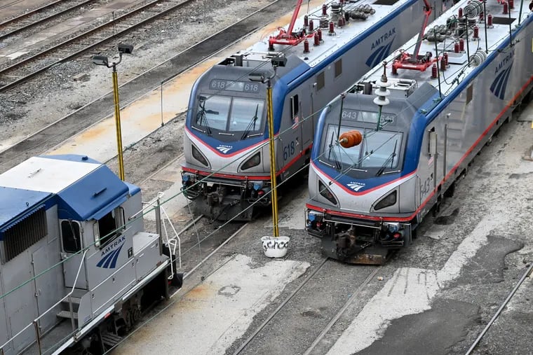Amtrak passenger train engines are idled at 30th Street Station in Philadelphia. Potential riders from Reading and Pottstown can now hop an Amtrak bus to get them to the train station.