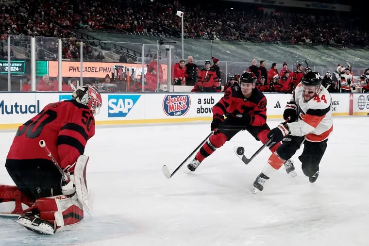 Nicolas Deslauriers shoots on New Jersey Devils goalie Nico Daws in the first period during the 2024 NHL Stadium Series at MetLife Stadium.