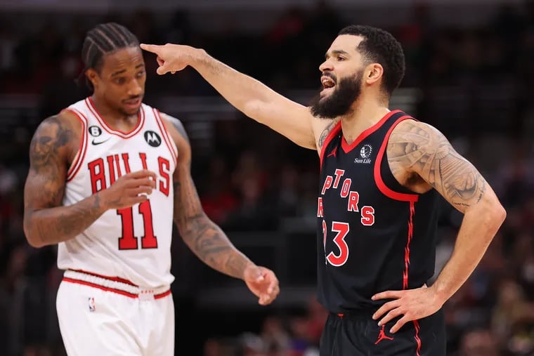Toronto Raptors guard Fred VanVleet (right) gestures as Chicago Bulls guard DeMar DeRozan (left) looks on during a matchup earlier this season. The Raptors and Bulls clash Wednesday in Toronto in an elimination NBA play-in tournament contest. (Photo by Michael Reaves/Getty Images)