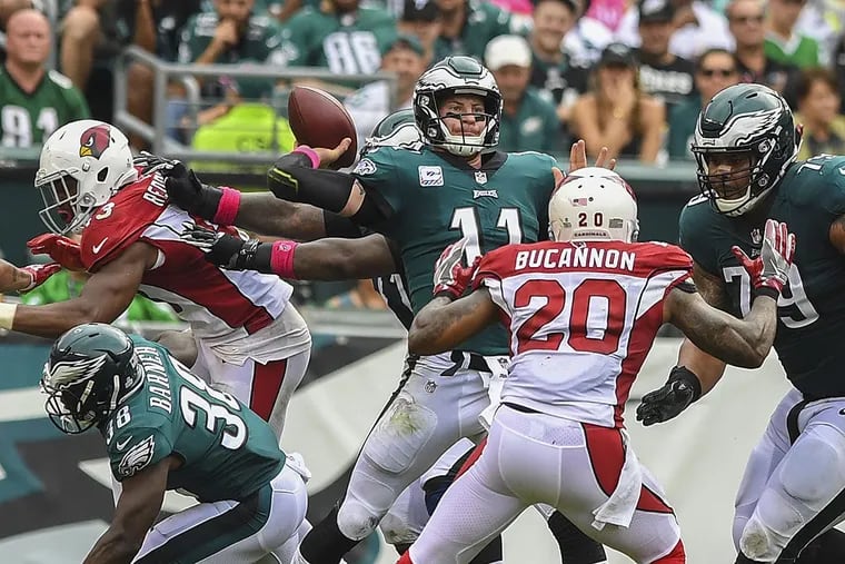 Eagles quarterback Carson Wentz rears back to fire a bomb to wide receiver Nelson Agholor for a 72-yard touchdown.