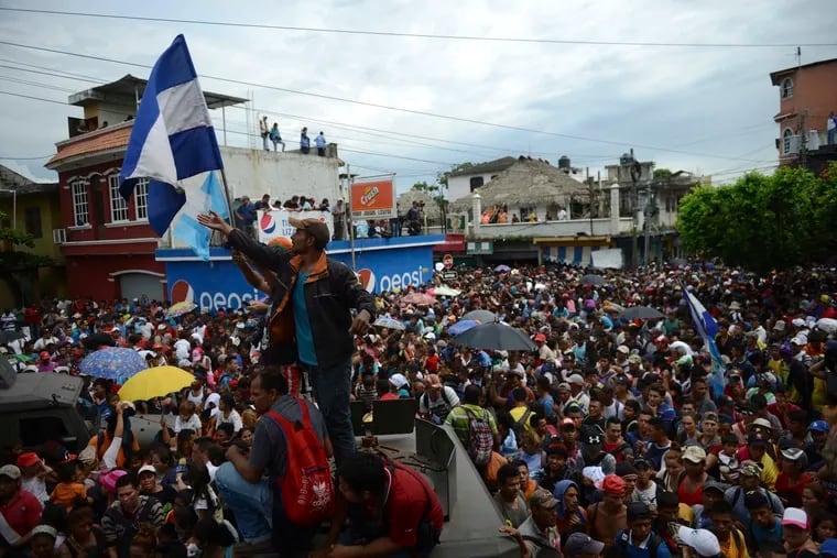 Thousands of Honduran migrants stream towards the border bridge in Tecun Uman, Guatemala, last week. A Campbell executuve tweeted that the caravan was planned by George Soros' Open Society.