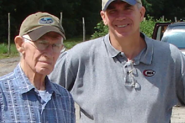 Bill Haines Jr. (left), with his father Bill Sr. in 2006 on the family's Haines' Pine Island Cranberry Co. operation.