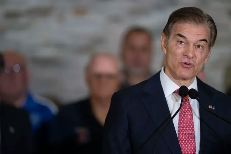 Republican U.S. Senate candidate Mehmet Oz talks to the media after accepting an endorsement from the Fraternal Order of Police on Sept. 26 at the FOP headquarters in Philadelphia.