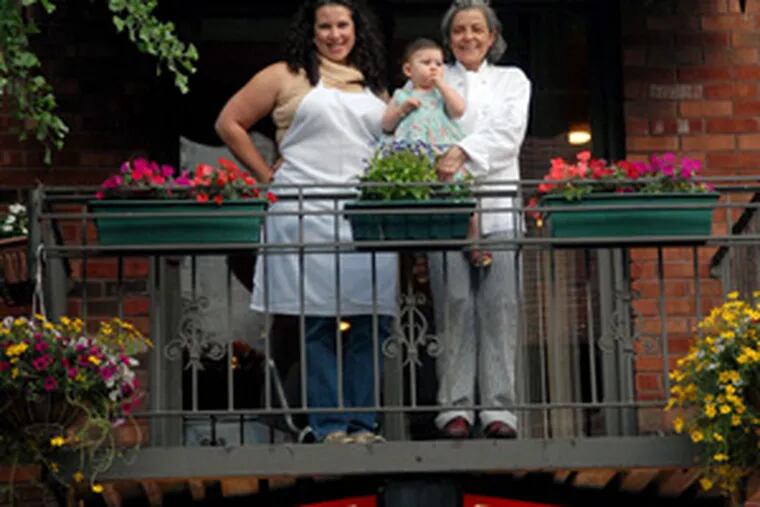 The proof is in the palate: The pastas at Tre Scalini are made elsewhere these days but "they are excellent," says Craig LaBan. "...  I really feel the quality has not suffered." Above, three generations on the balcony at the Passayunk Avenue restaurant (from left): daughter-manager Francesca DiRenzo, her daughter Gisella, and chef-owner Franca Di Renzo.