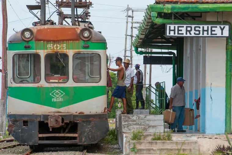 Passengers on the &quot;Hershey train&quot; disembark in Central Camilo Cienfuegos.