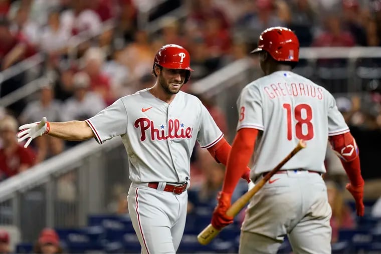 The Phillies' Matt Vierling, left, celebrates his solo home run with Didi Gregorius in the eighth inning on Friday.