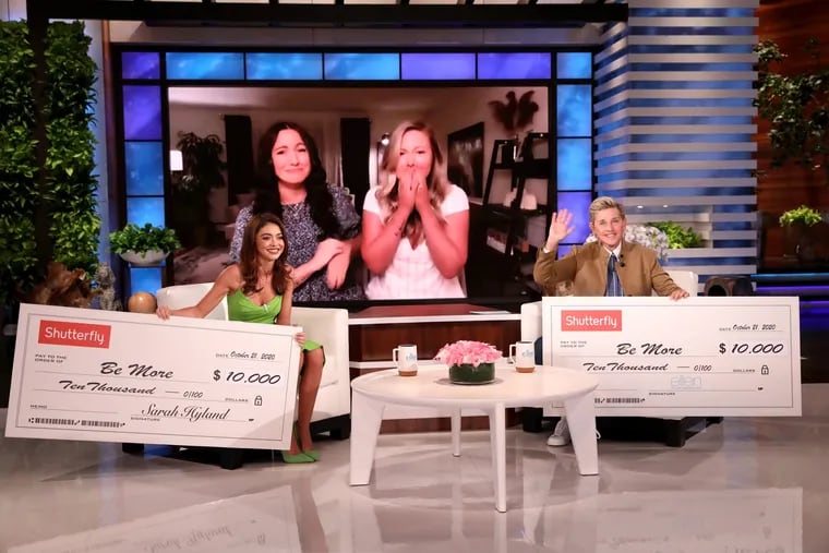 Breanna Sipple (left on big screen) and Erin Francis on Zoom call with actress Sarah Hyland (left, foreground) and Ellen DeGeneres on an episode of "Ellen" airing Wednesday, Oct. 21. The two Philadelphia area women, who became friends when Sipple donated a kidney to Francis three years ago, were surprised with two checks for $10,000 each for their organization,  BeMore, which promotes organ donation.