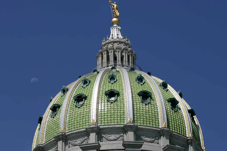 The dome of the State Capitol Building is seen in Harrisburg. (AP Photo/Carolyn Kaster)