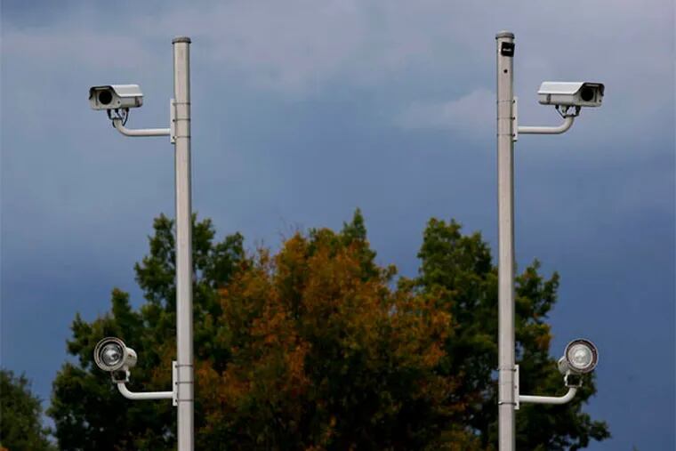 Red-light cameras at Roosevelt Boulevard and Southampton Road in Philadelphia. (Michael S. Wirtz / Staff Photographer)