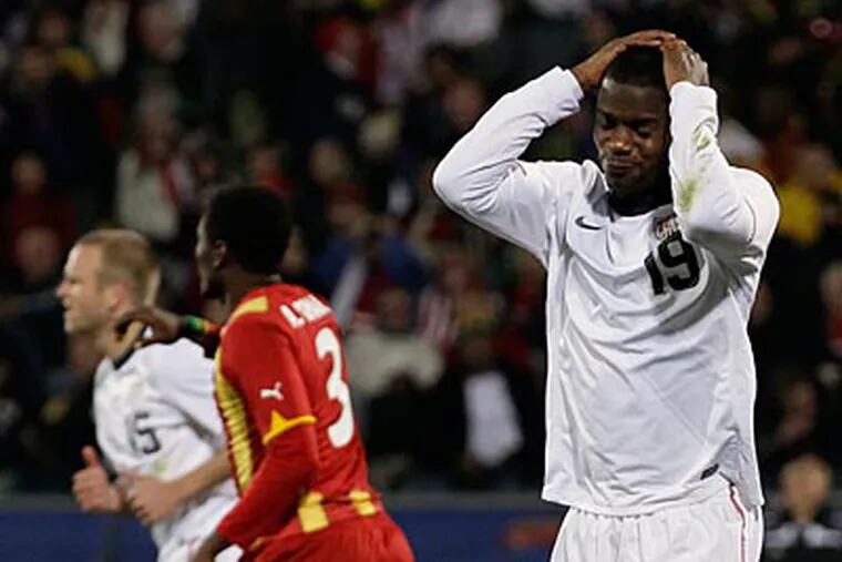 United States' Maurice Edu, right, reacts after a missed scoring opportunity during the U.S.'s 2-1 loss to Ghana. (AP Photo/Ivan Sekretarev)