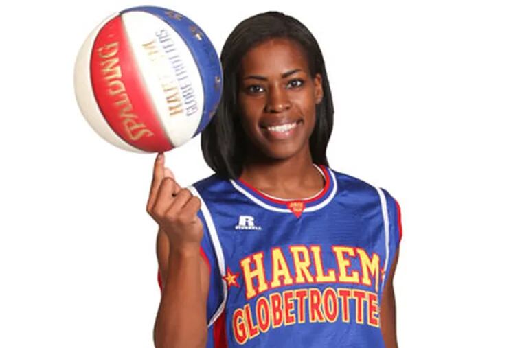 Temple alum Fatima Maddox learned the tricks of the trade during Globetrotters training camp.