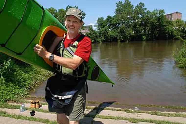 Ted Danforth of Hidden River Outfitters on the Schuylkill River. ( April Saul / Staff Photographer)