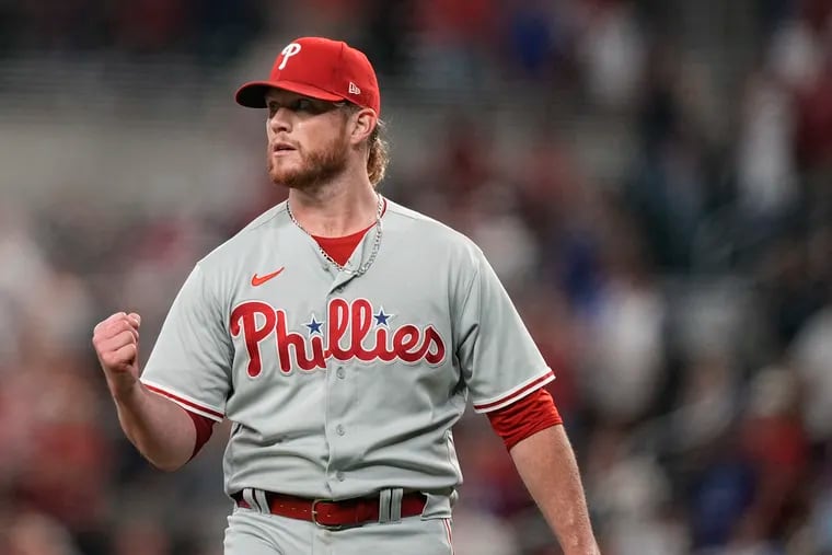Phillies relief pitcher Craig Kimbrel celebrates earning his 400th save in a 6-4 win over the Atlanta Braves on Friday night.