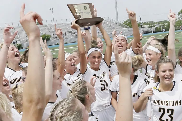 Moorestown celebrates after beating Mendham in the Group 3 championship.