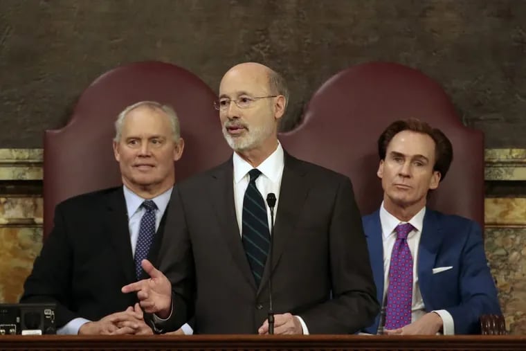 Gov. Wolf giving his budget address at the state Capitol on Feb. 6. He is flanked by House Speaker Mike Turzai (left) and Lt. Gov. Mike Stack. Wolf rejected Tuesday a map proposed by Turzai and Senate President Pro Tempore Joe Scarnati, the top Republicans in the legislature. Now the various parties, including Wolf, Turzai, and Stack, can propose maps to the Pennsylvania Supreme Court.